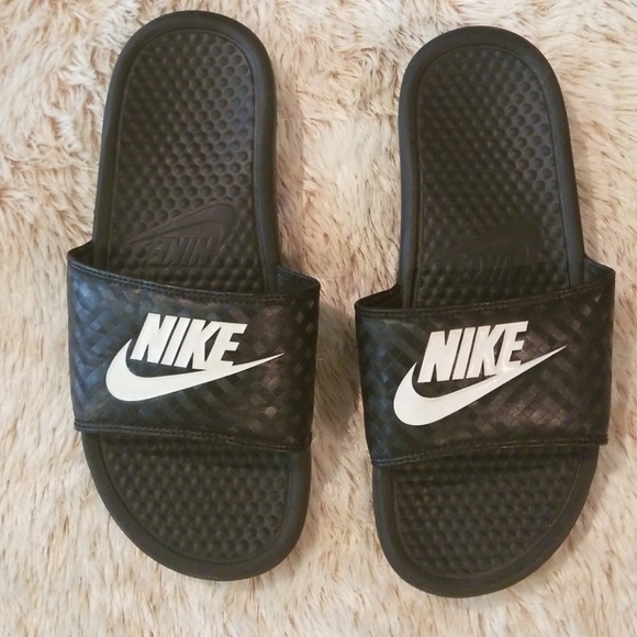 the bay nike slides